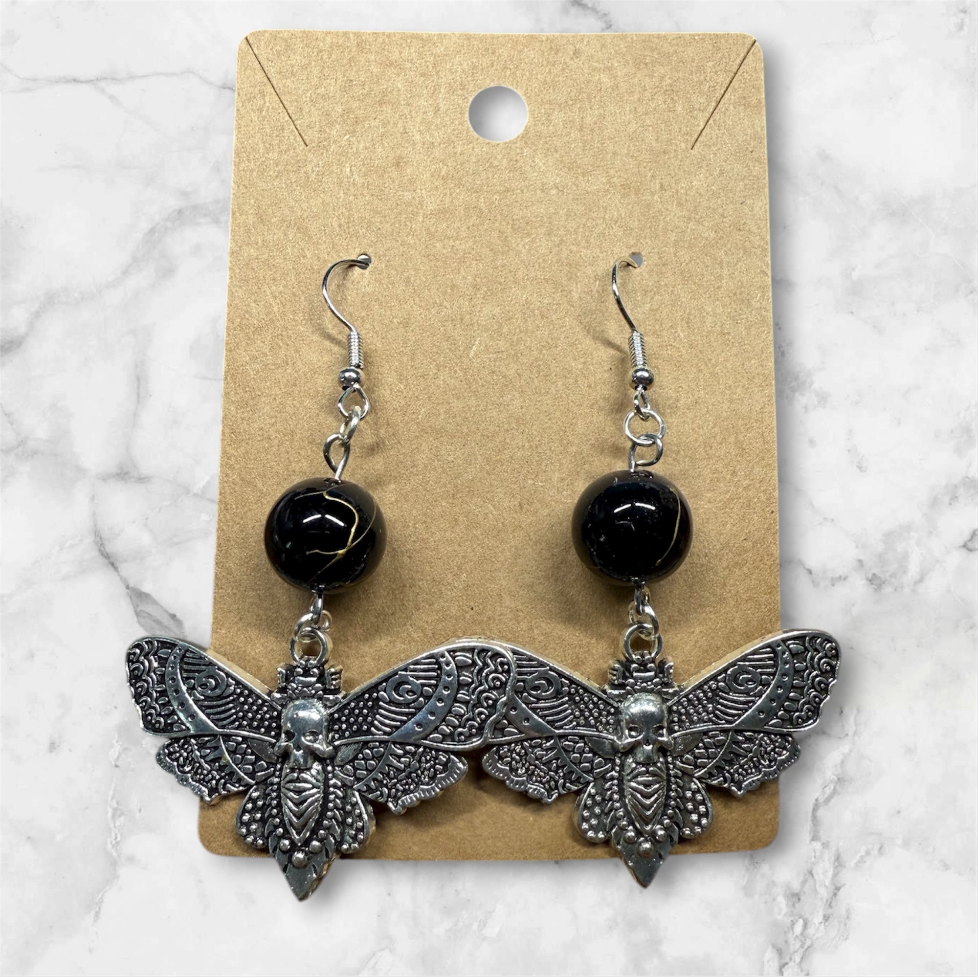 Boucles d’oreilles sphinx tête de mort / pièce unique