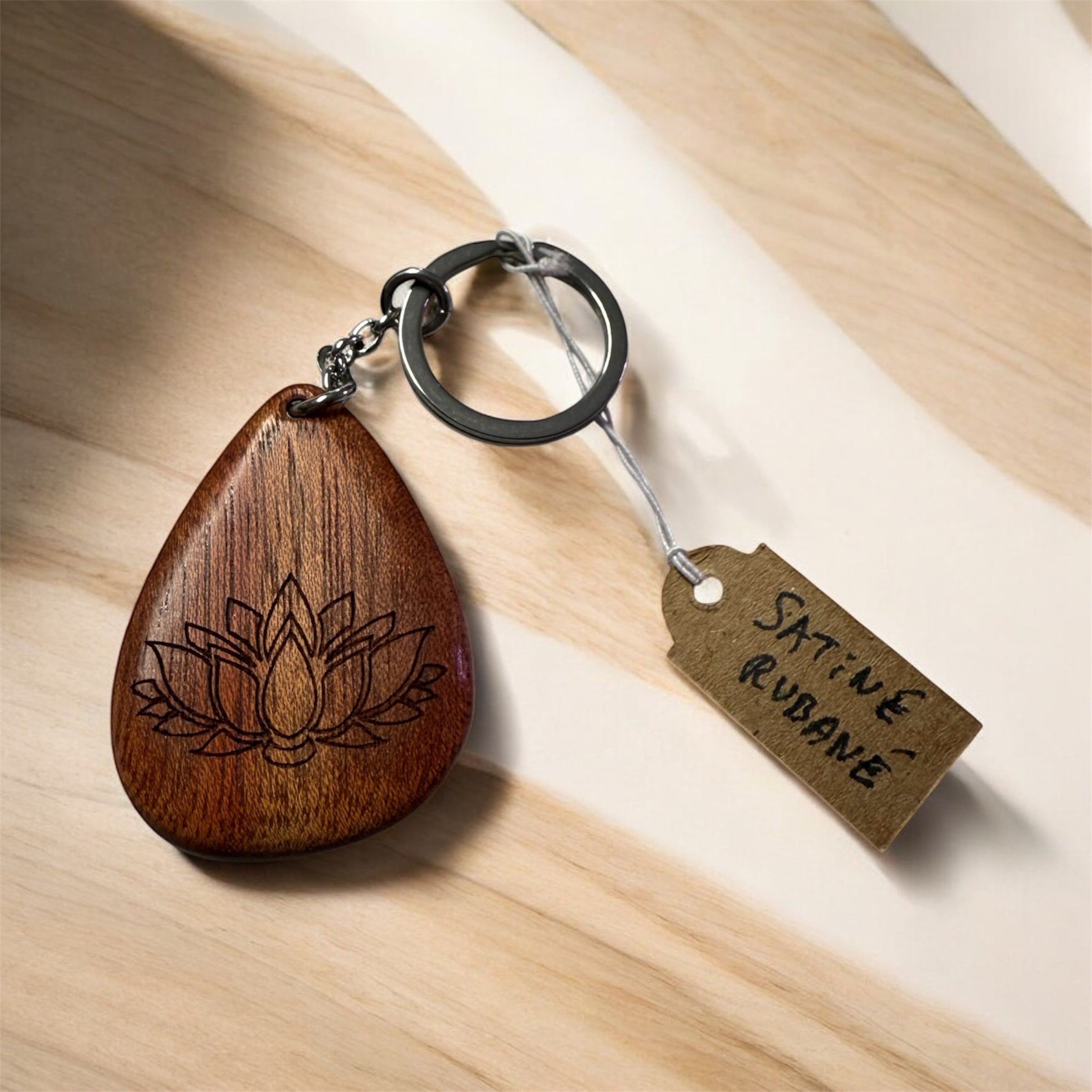 Porte clé lotus - Didier Kochersperger