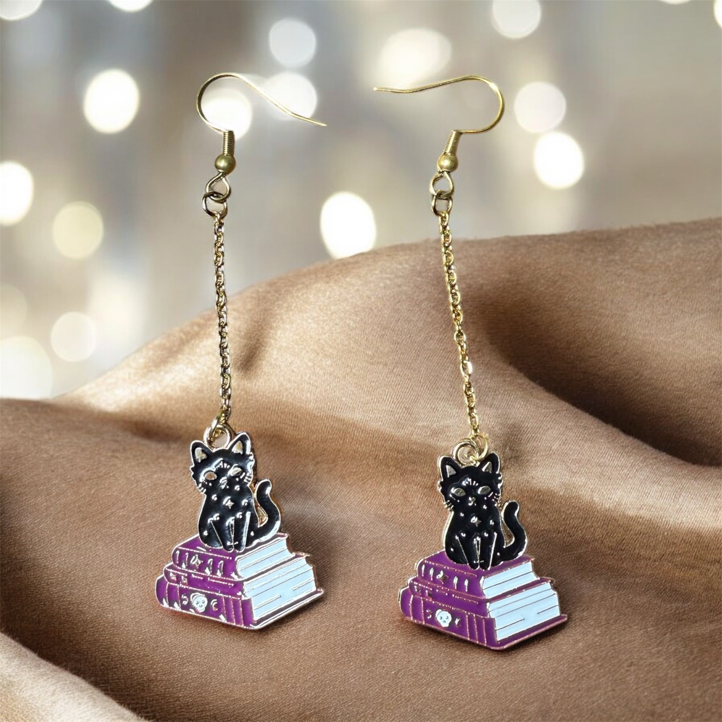 Boucles d’oreilles chat livre