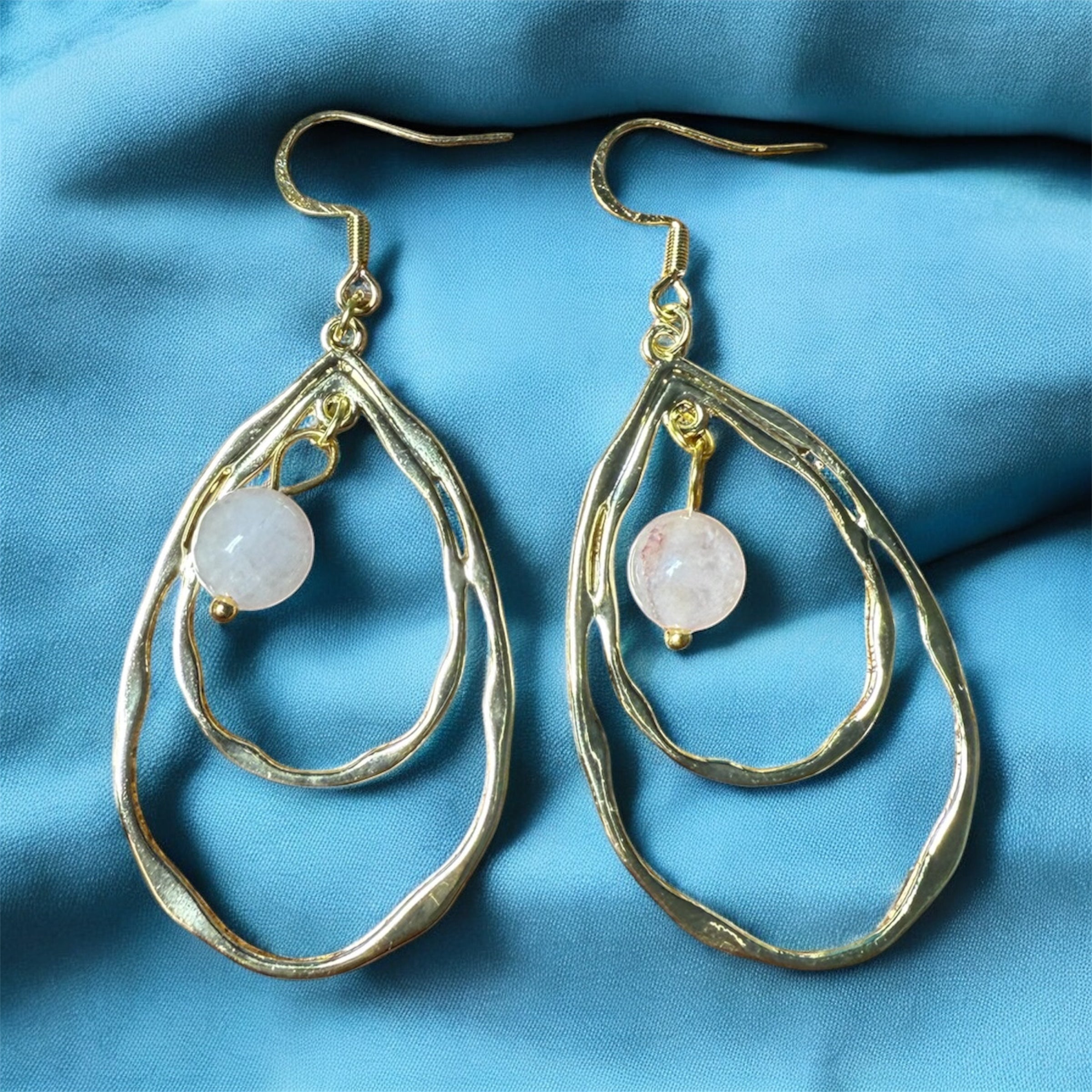 Boucle d’oreille « énergies positives »