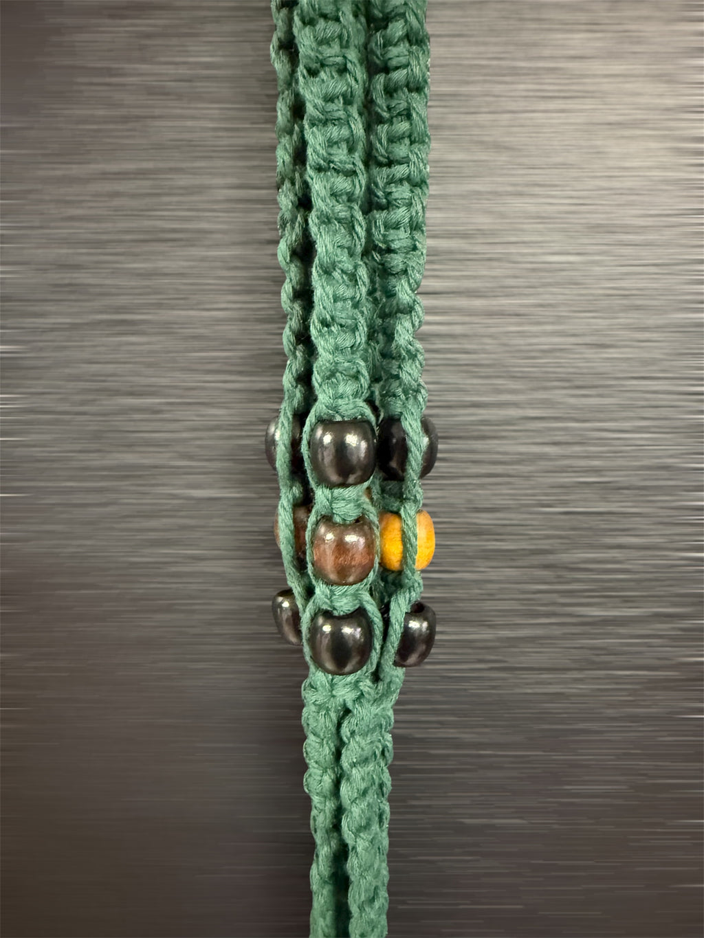 Porte plante en macramé / vert sapin