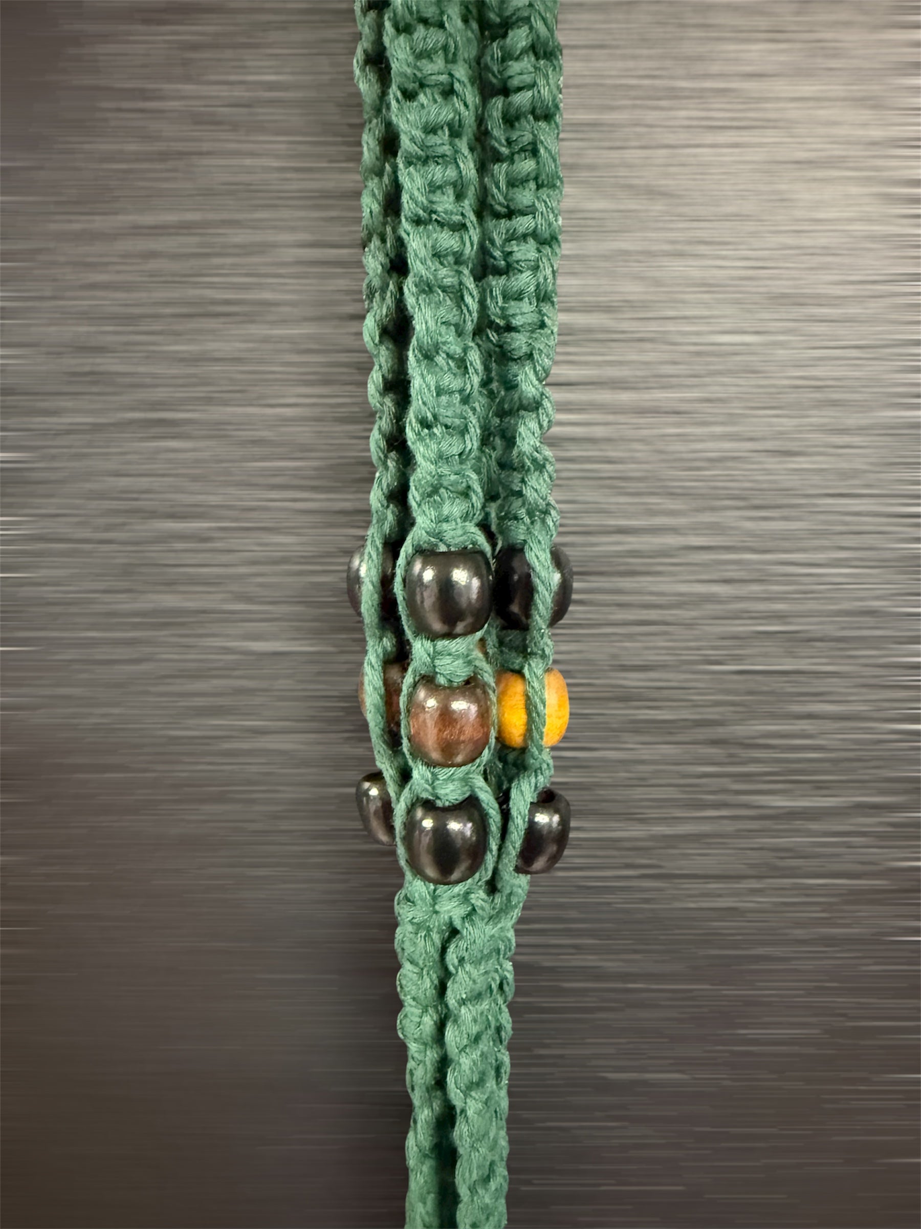 Porte plante en macramé / vert sapin